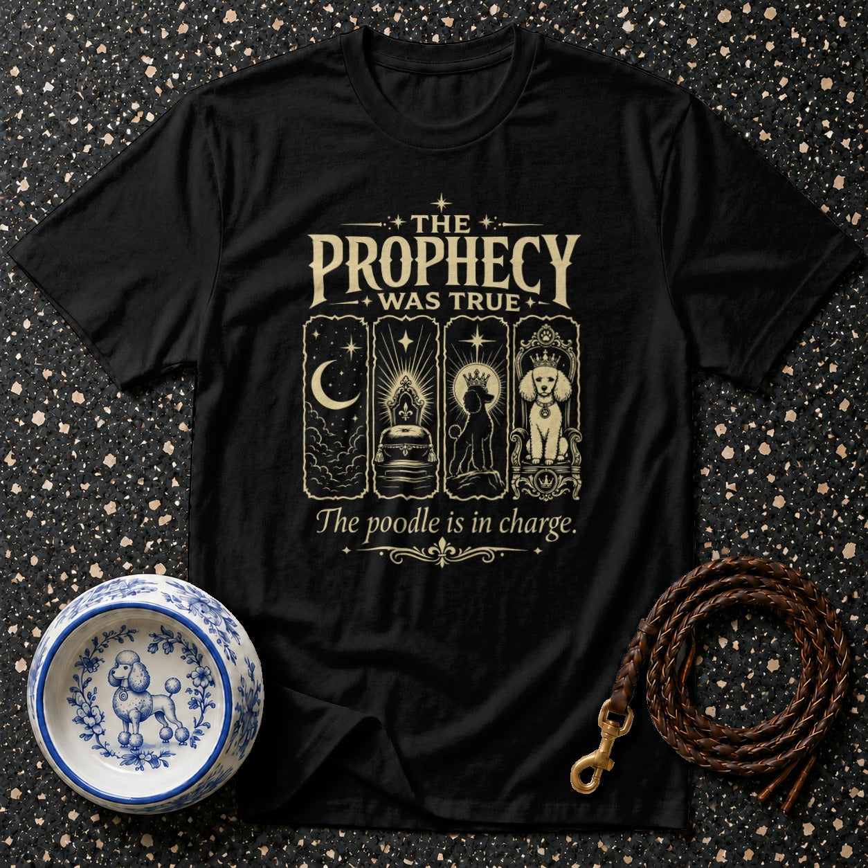 Black t-shirt with "The Prophecy Was True" and a poodle in charge.