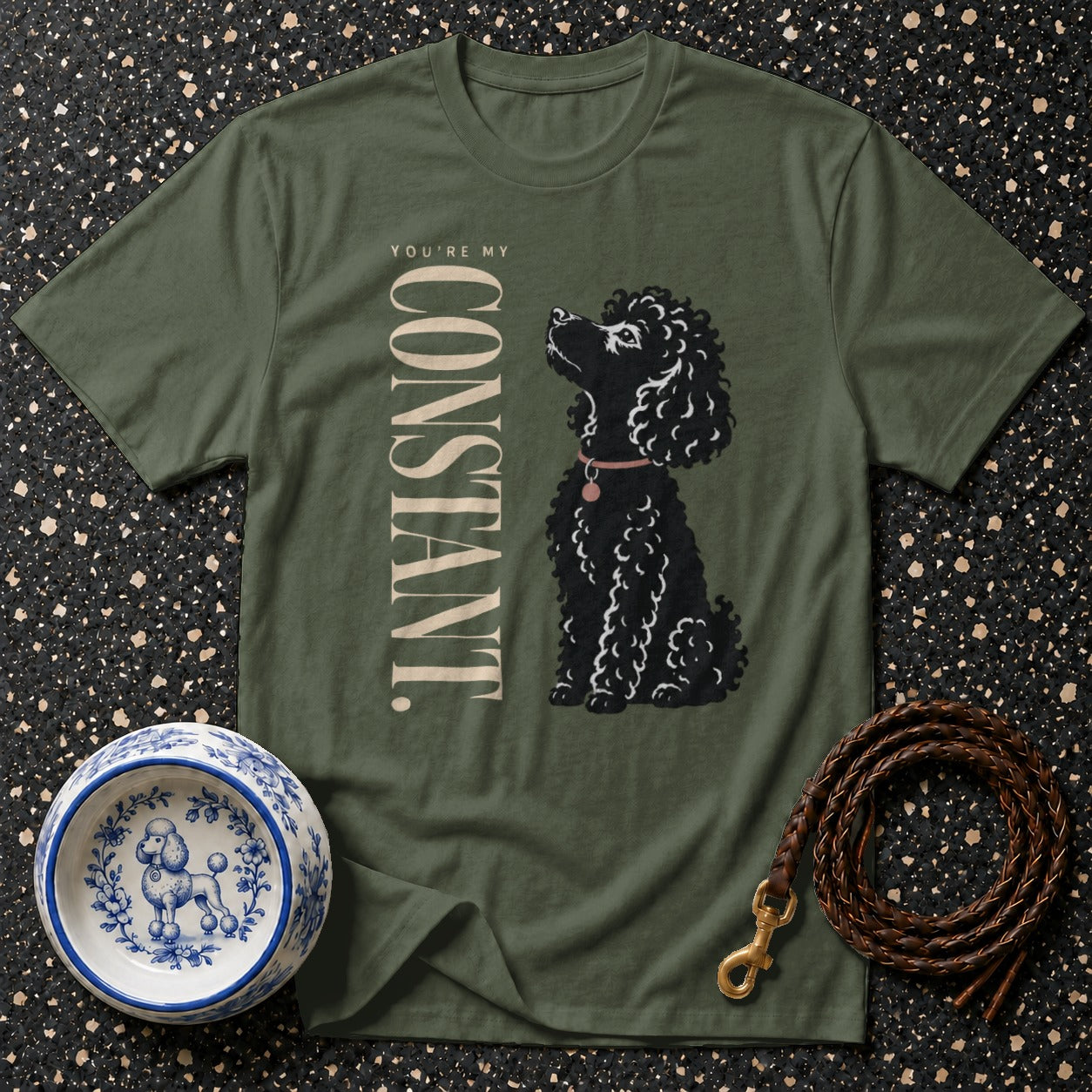 Green t-shirt with a black poodle illustration and "You're My Constant" text.