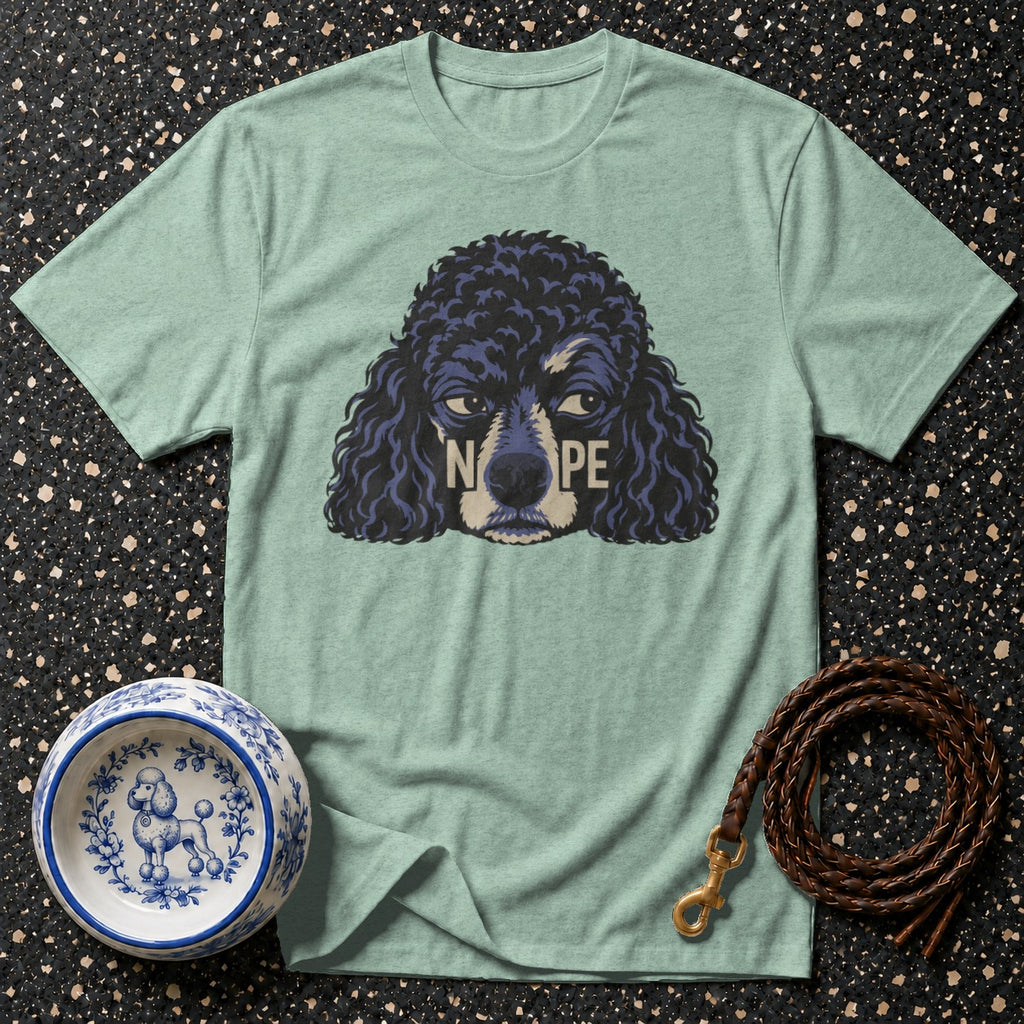 Light mint t-shirt with a dark poodle graphic reading "NOPE" and a patterned dog bowl.