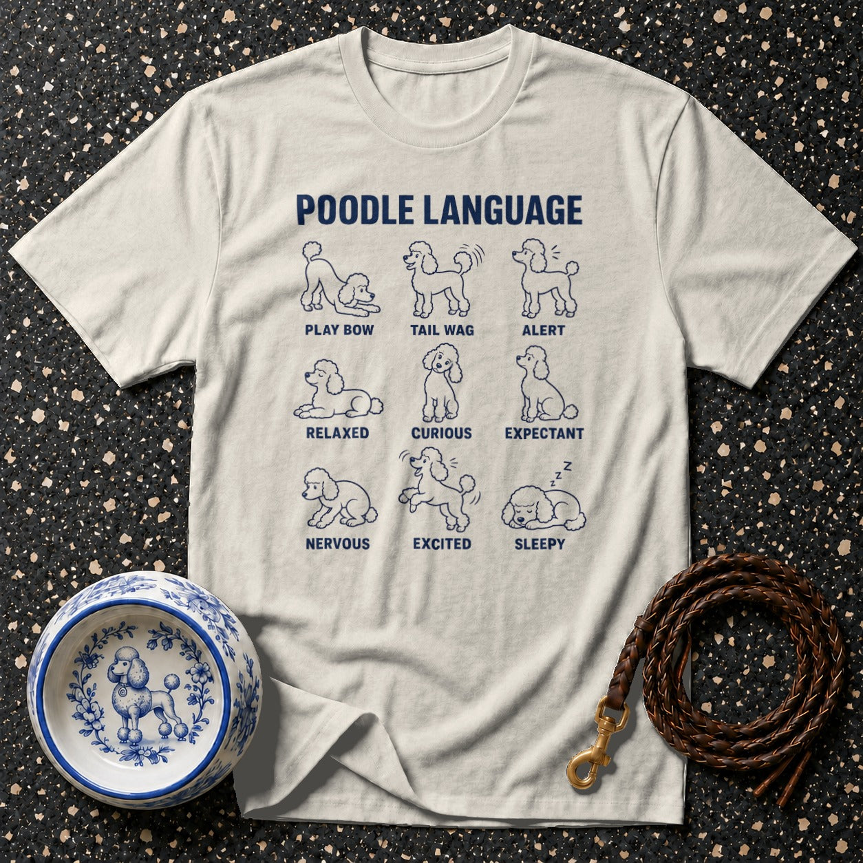 Light t-shirt with "Poodle Language" and nine poodle poses with descriptions.