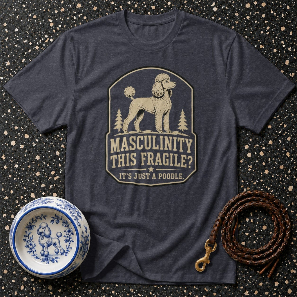 Dark t-shirt with a poodle graphic and text that reads "MASCULINITY THIS FRAGILE? IT'S JUST A POODLE."