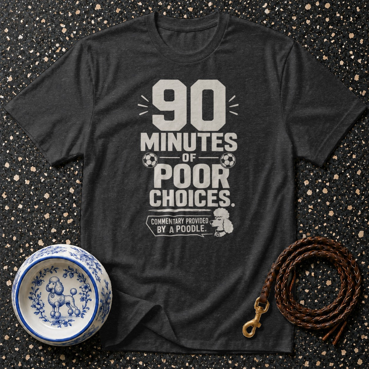 Dark t-shirt with "90 MINUTES OF POOR CHOICES. COMMENTARY PROVIDED BY A POODLE." text and poodle graphic.