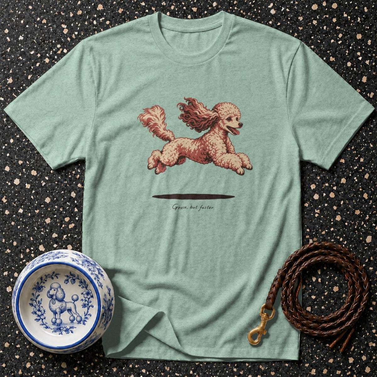 Light mint t-shirt with a running poodle graphic and text "Grace, but faster."