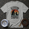 Grey t-shirt with "Attention Must Be Paid Poodle Support Staff" text and poodle graphic.