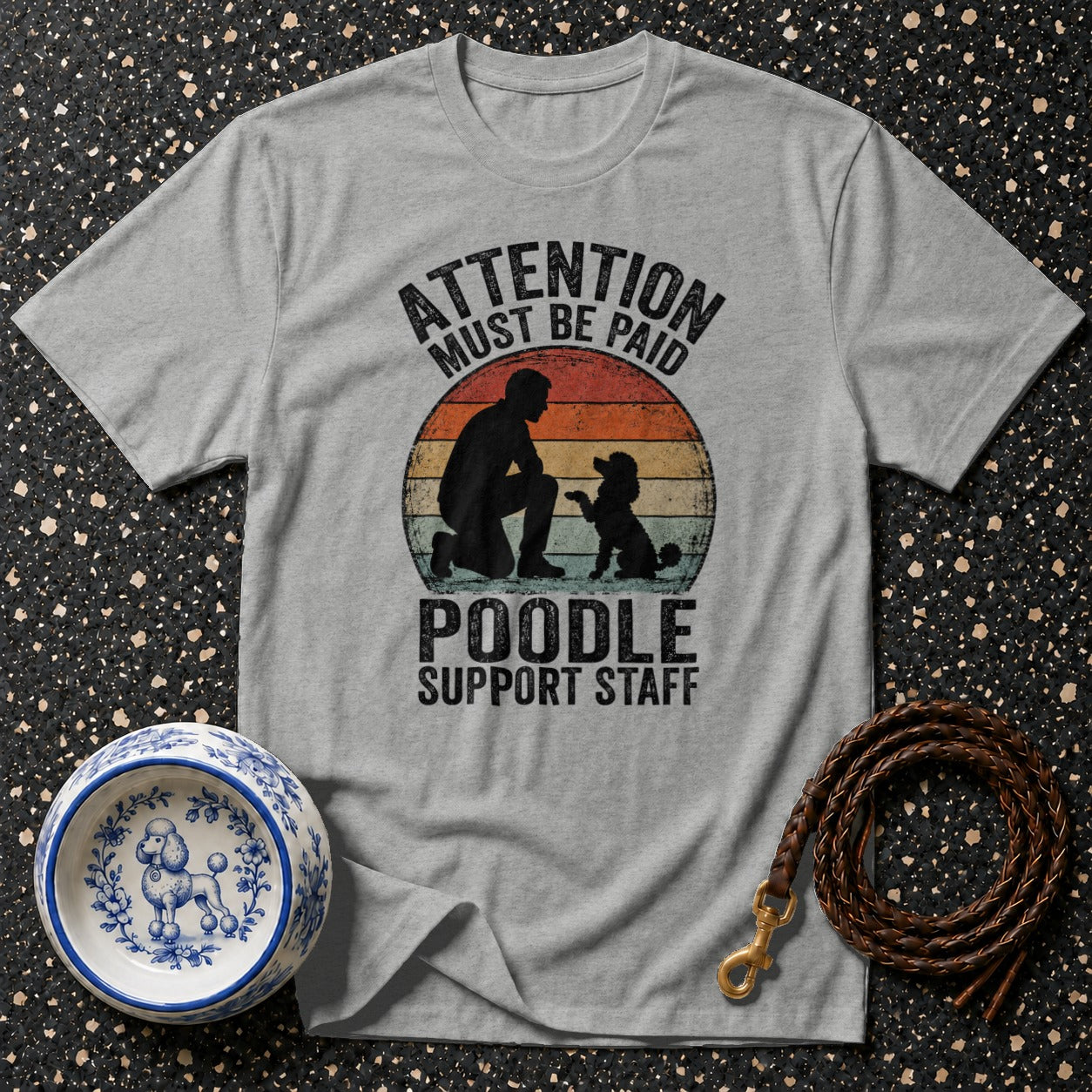 Grey t-shirt with "Attention Must Be Paid Poodle Support Staff" text and poodle graphic.