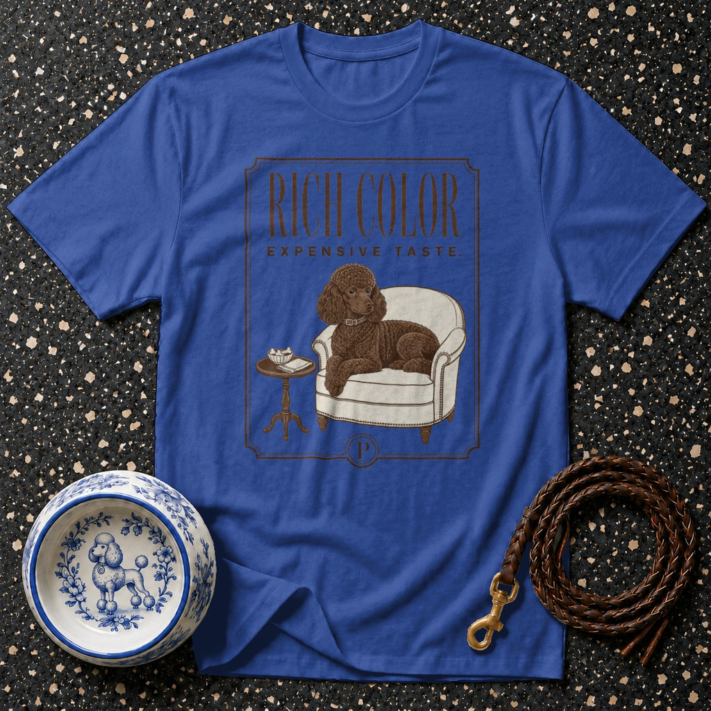 Blue t-shirt with a P-logo, text "RICH COLOR EXPENSIVE TASTE", and dog illustration.
