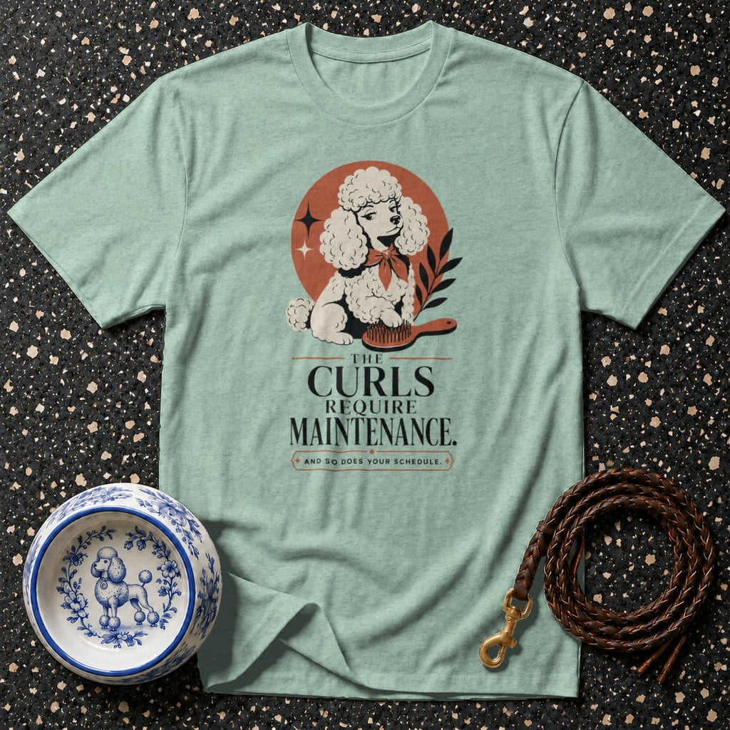 Light blue t-shirt with poodle illustration and text "The Curls Require Maintenance."