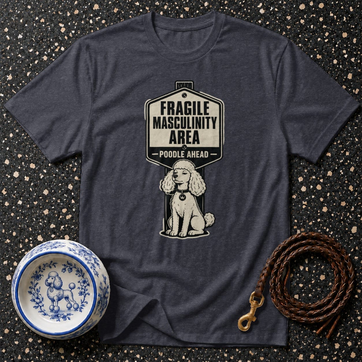 T-shirt with "FRAGILE MASCULINITY AREA - POODLE AHEAD" and poodle drawing.