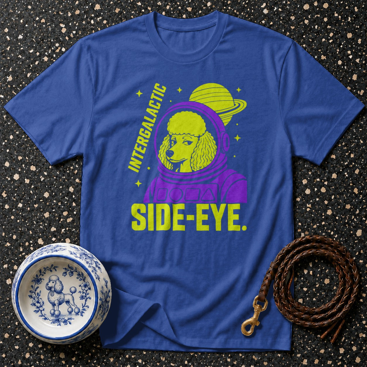 Blue t-shirt with a poodle in a spacesuit, text "INTERGALACTIC SIDE-EYE."