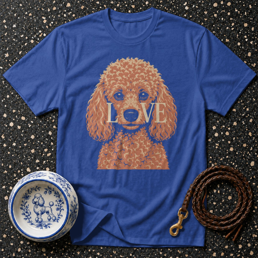 Blue t-shirt with poodle graphic and "LOVE" text, next to a dog bowl and leash.