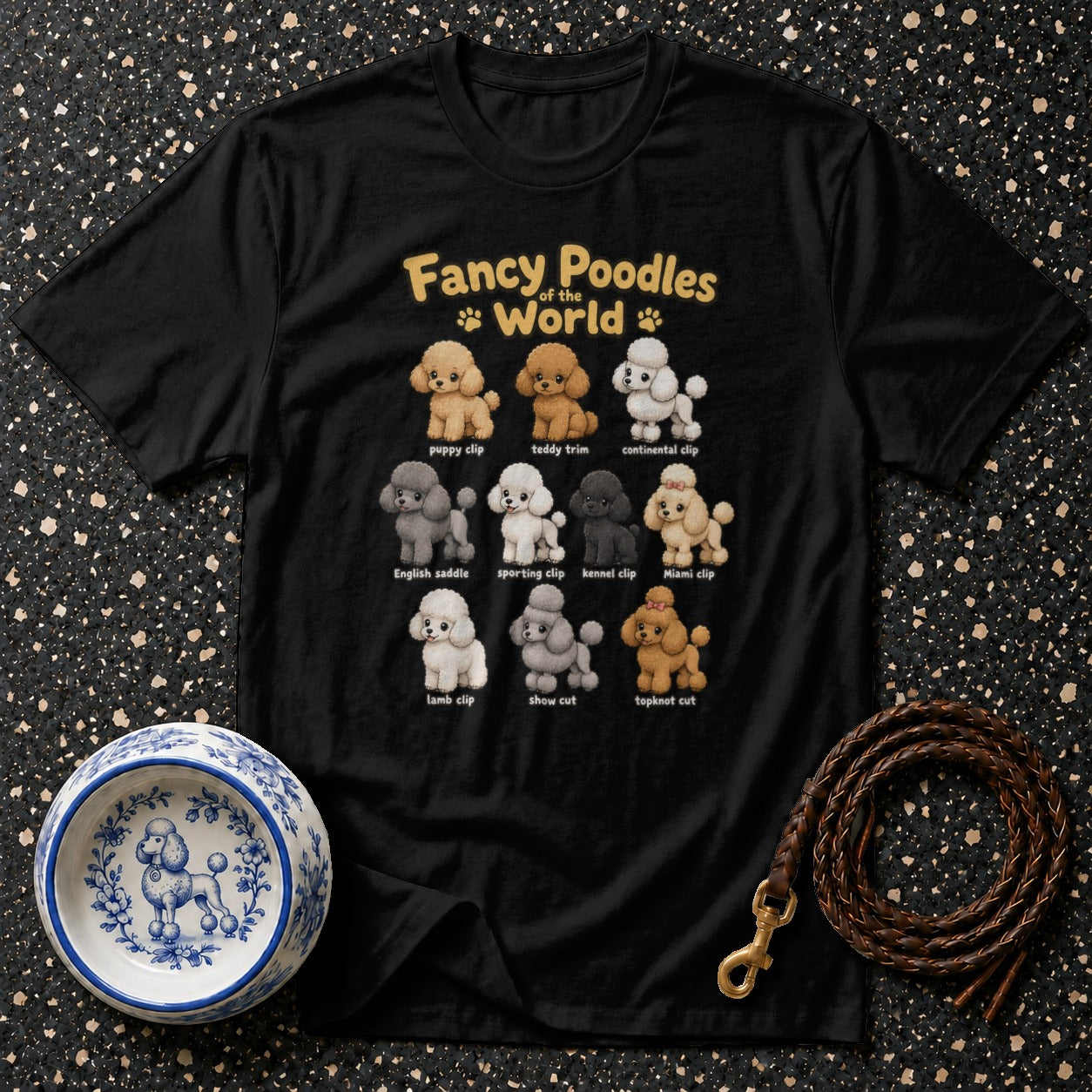 Black t-shirt featuring "Fancy Poodles of the World" with illustrations of poodles in various clips.
