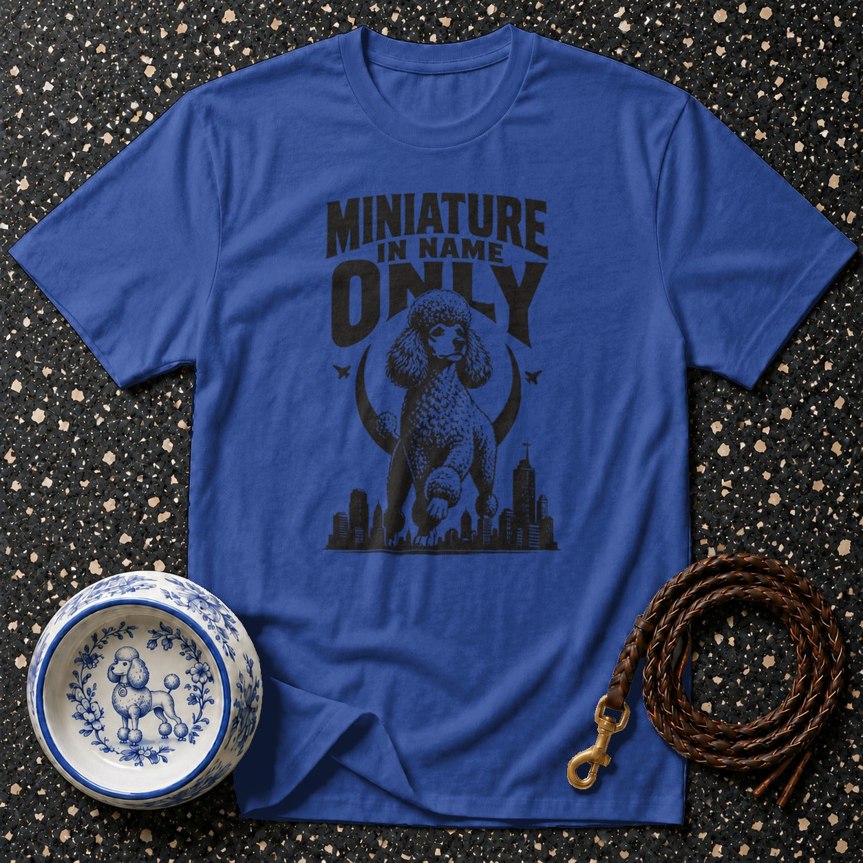 Blue t-shirt with black poodle graphic and text "MINIATURE IN NAME ONLY".