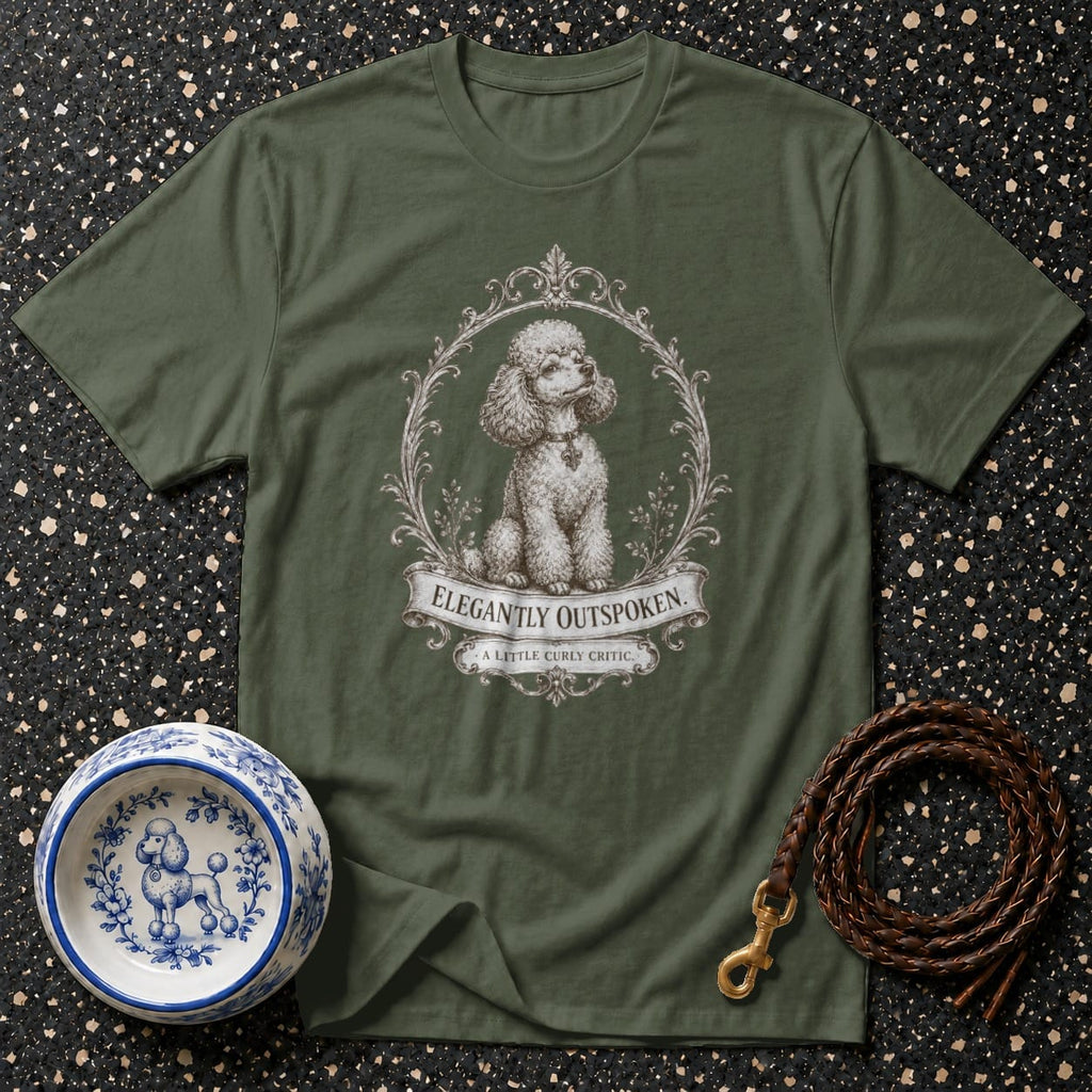 Green t-shirt with a framed poodle and text saying "ELEGANTLY OUTSPOKEN. A LITTLE CURLY CRITIC."