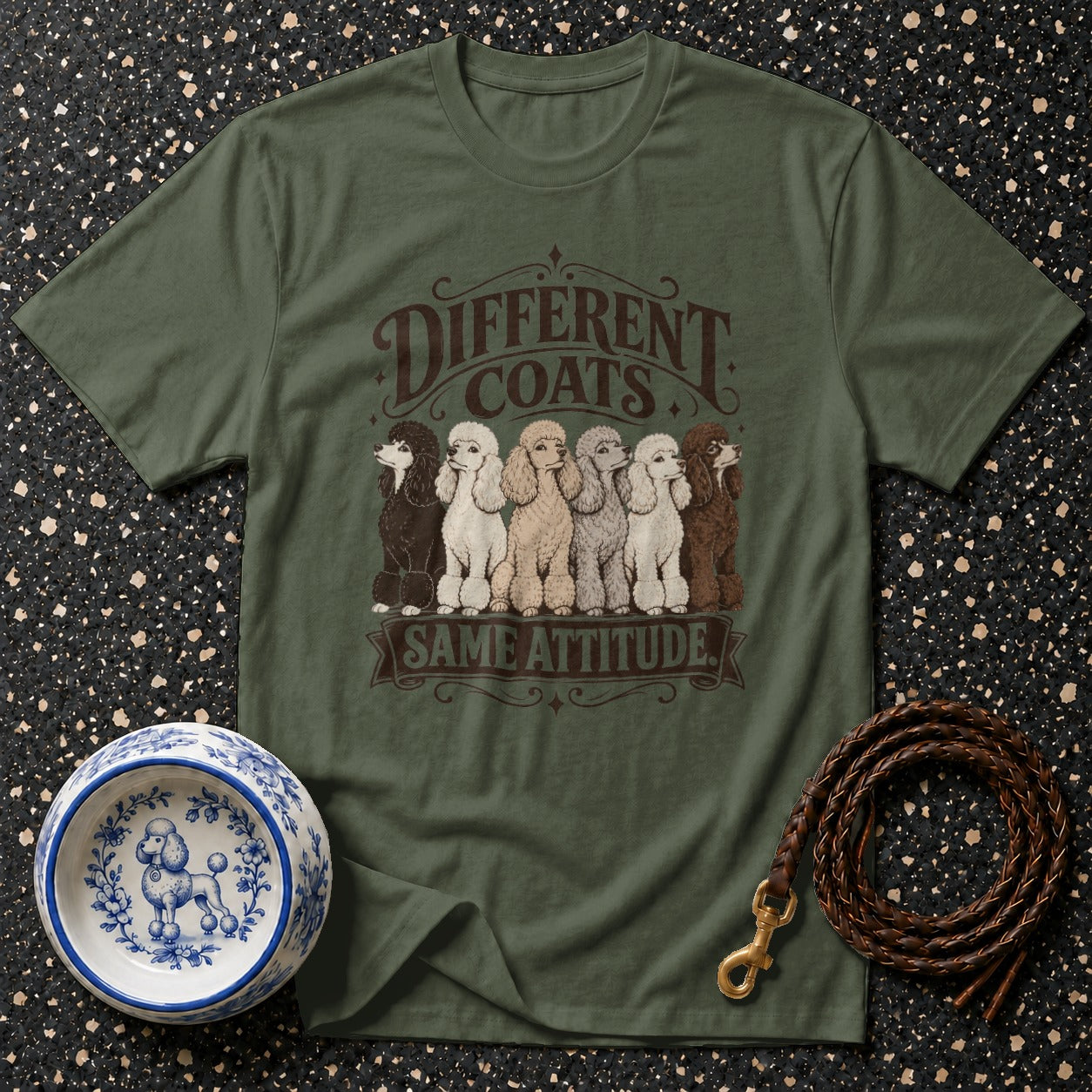 Green t-shirt with poodles of different colors and text "Different Coats Same Attitude".