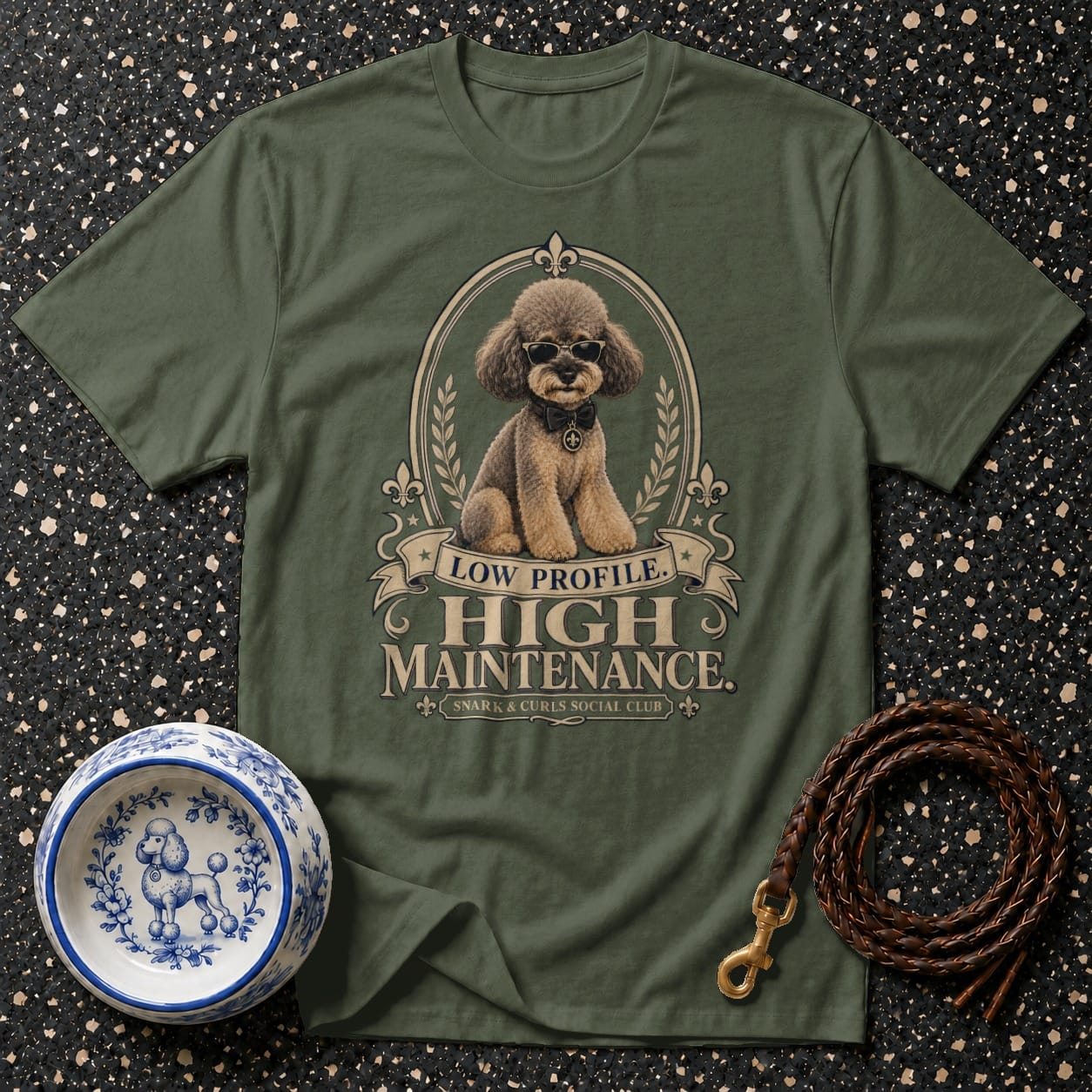 Olive t-shirt with a poodle wearing sunglasses and text "Low Profile. High Maintenance."