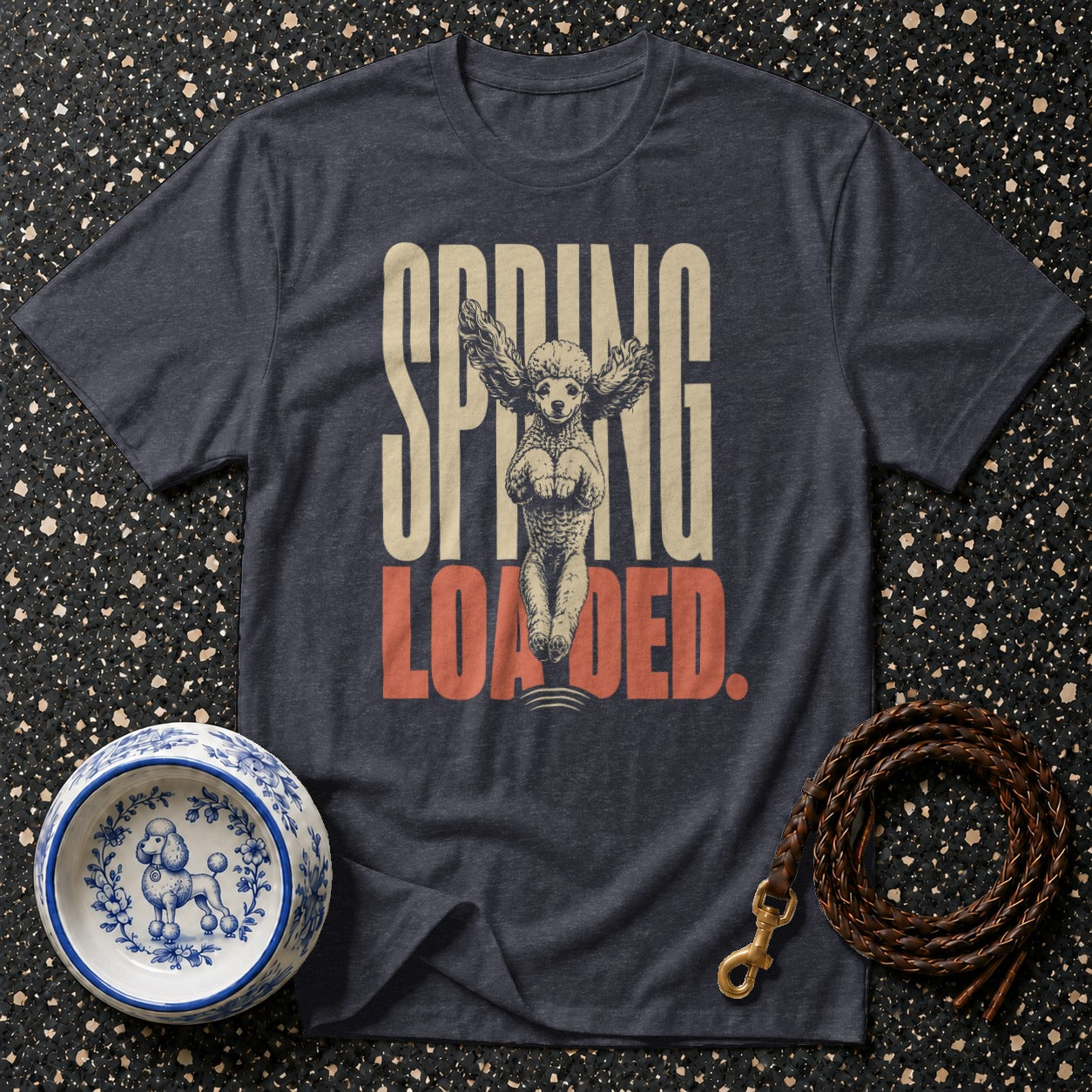 T-shirt with "SPRING LOADED" text and a poodle with wings.