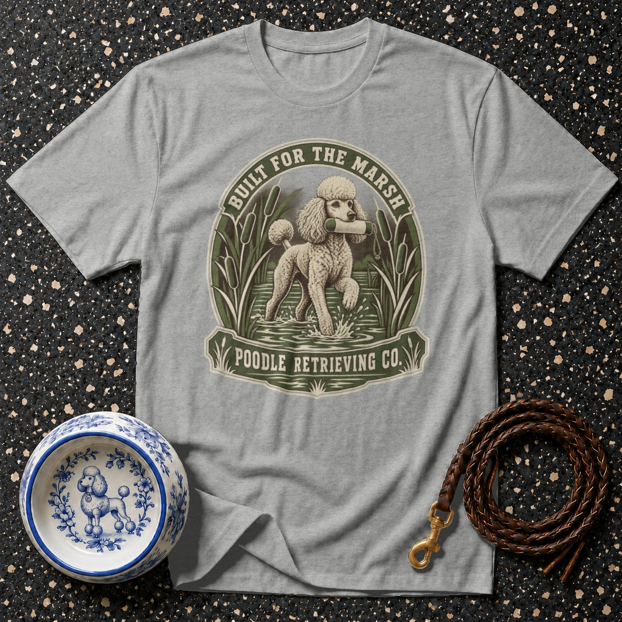 Gray t-shirt with a poodle graphic featuring text "BUILT FOR THE MARSH POODLE RETRIEVING CO."
