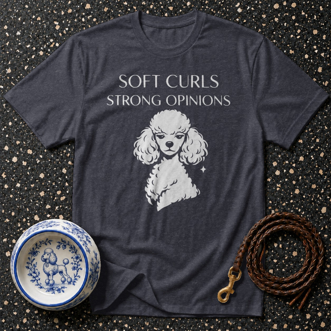 Dark grey t-shirt with white poodle graphic and text "SOFT CURLS STRONG OPINIONS".
