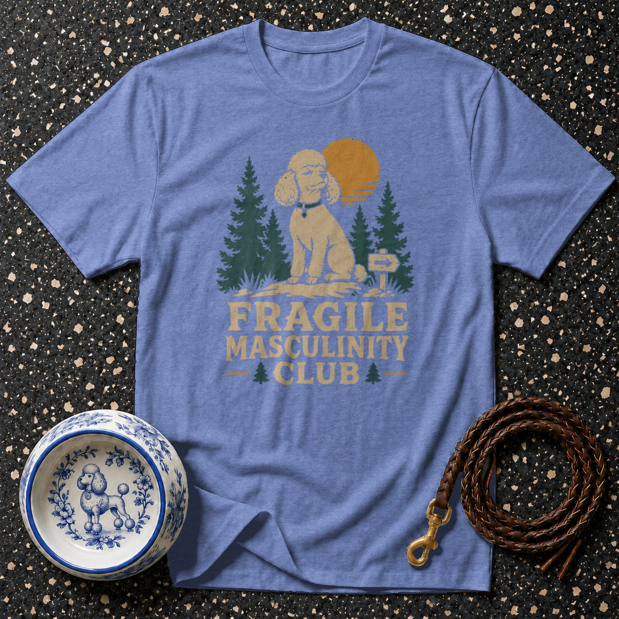 Blue t-shirt with "Fragile Masculinity Club" text and a poodle graphic.
