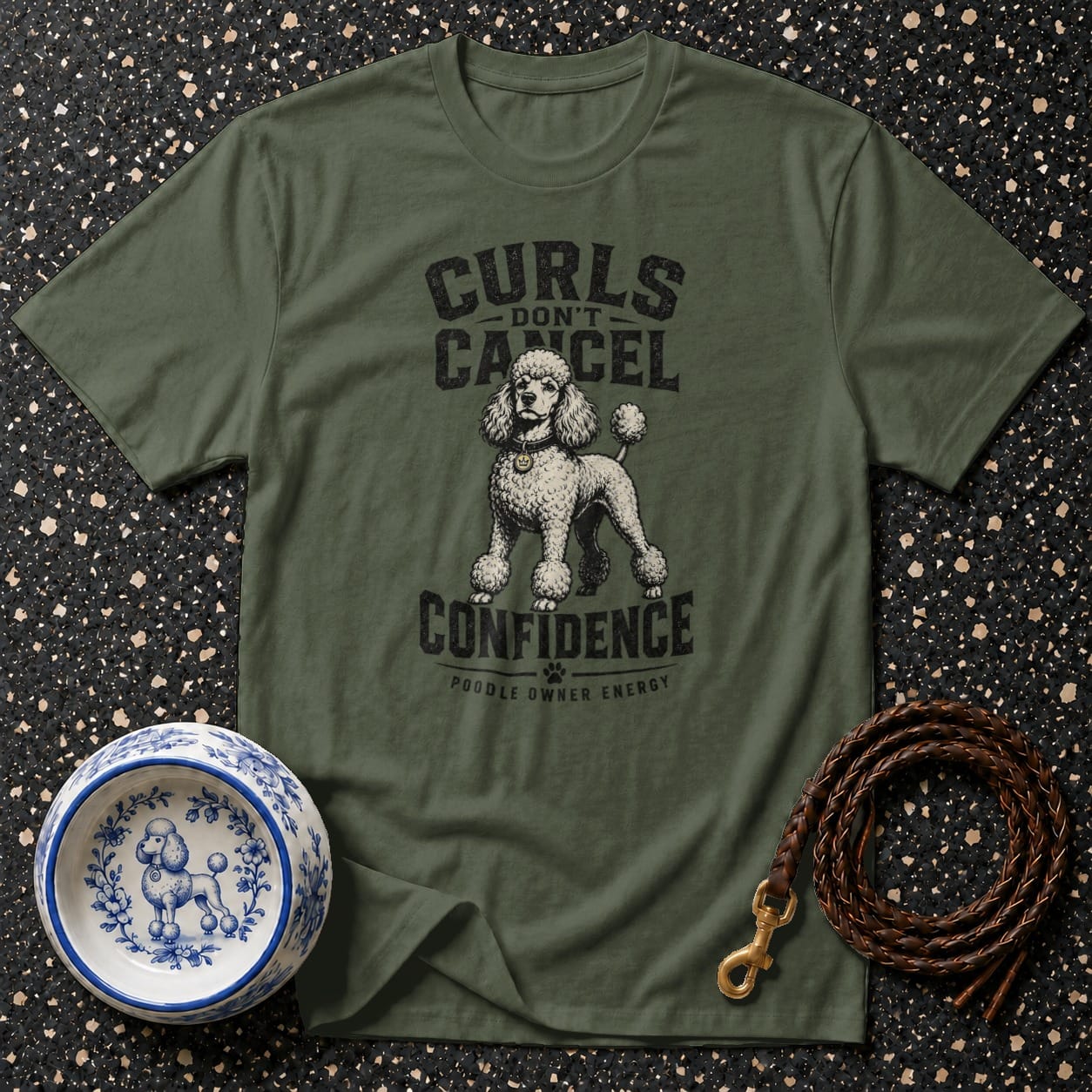 Green t-shirt with poodle graphic reading "Curls Don't Cancel Confidence".