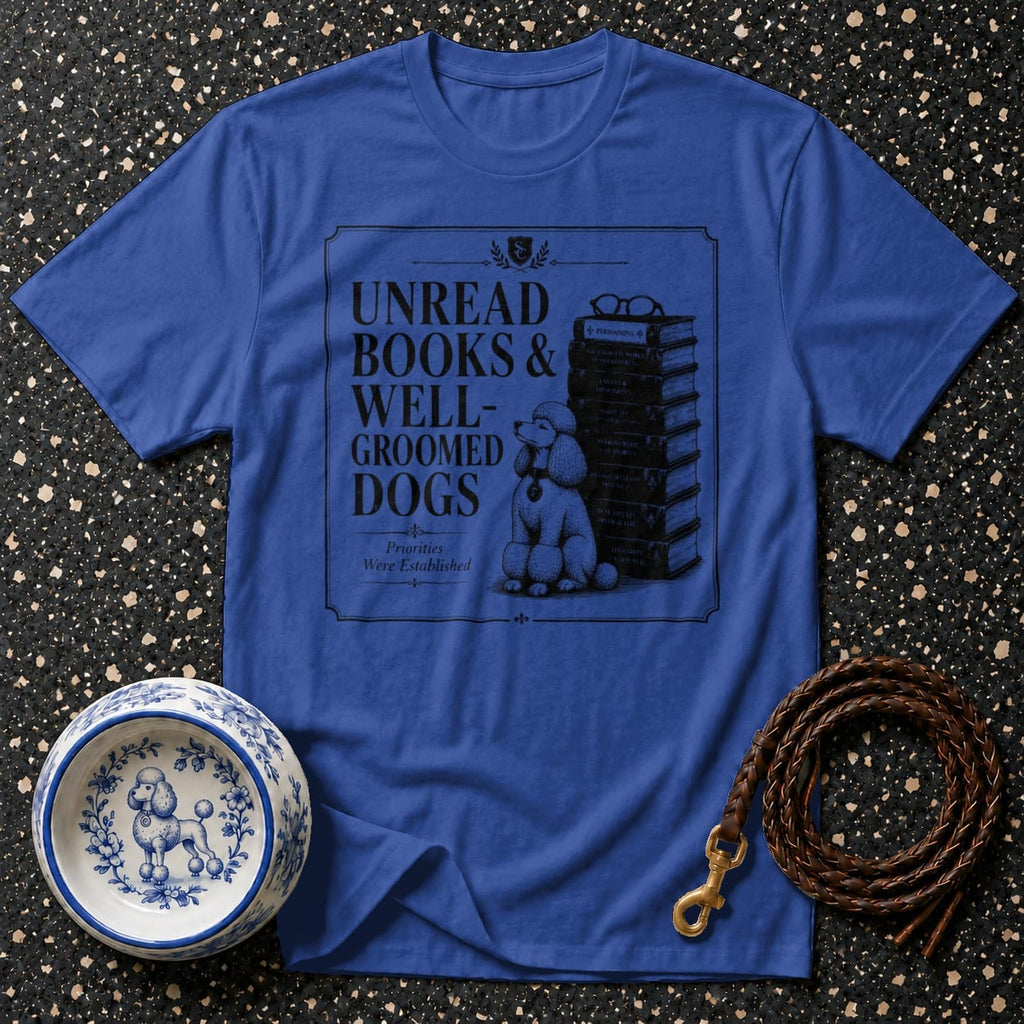 Blue t-shirt with "Unread Books & Well-Groomed Dogs" text and poodle illustration.