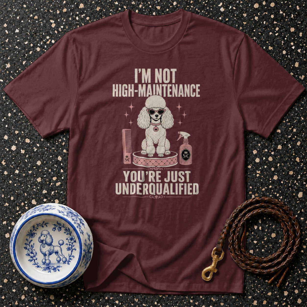 Maroon t-shirt with poodle graphic and text "I'm not high-maintenance, you're just underqualified."