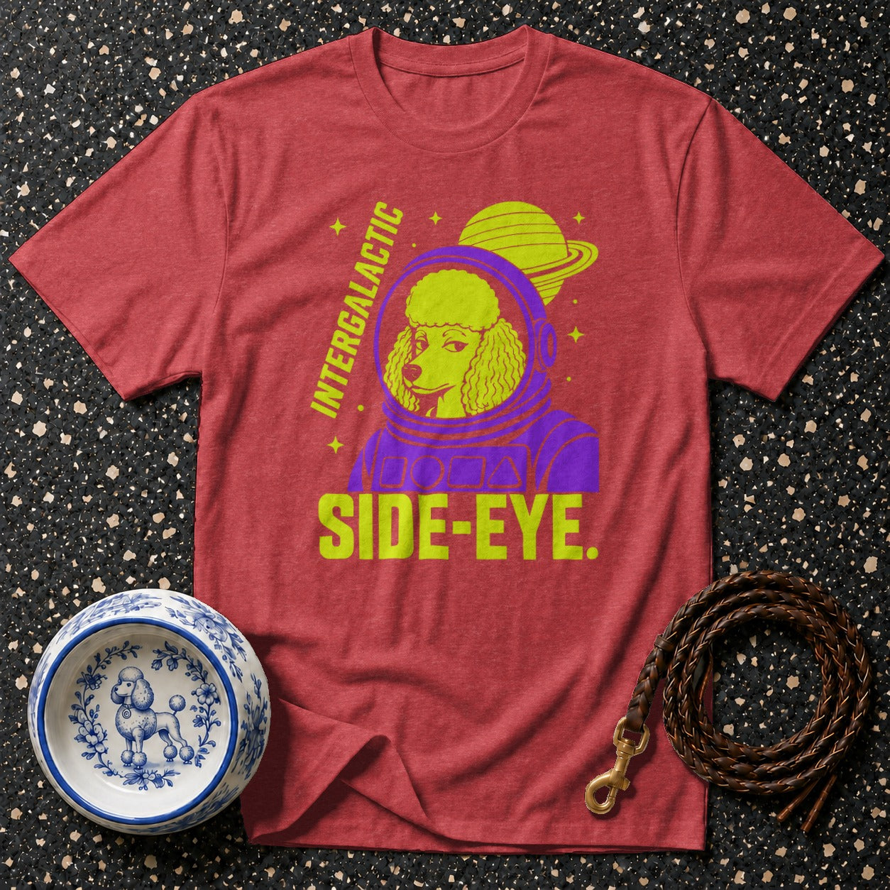 Red t-shirt with a poodle in a space helmet and text "INTERGALACTIC SIDE-EYE".