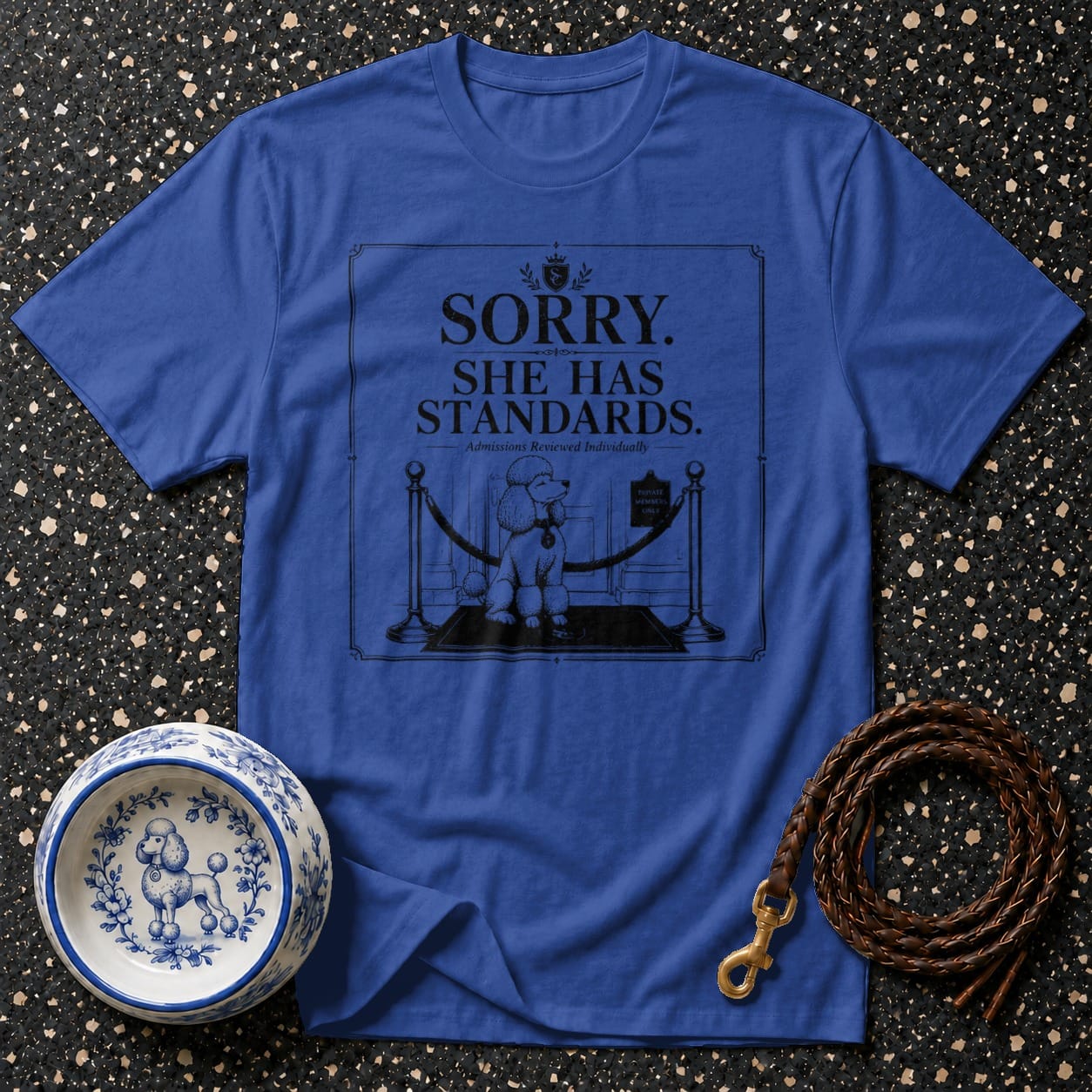 Blue t-shirt with poodle graphic saying "Sorry, she has standards."