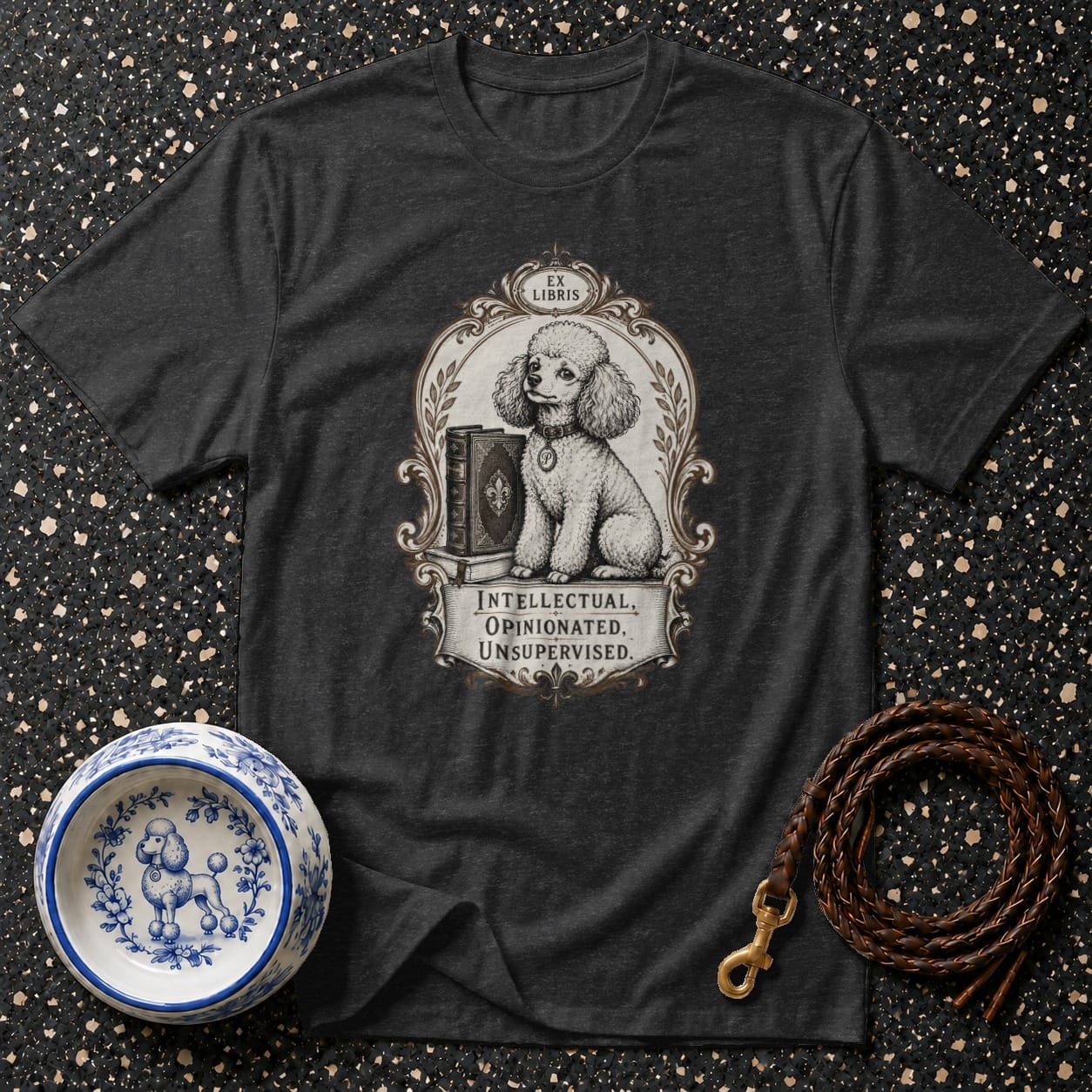 Dark gray t-shirt with antique illustration of poodle reading "EX LIBRIS" by books.