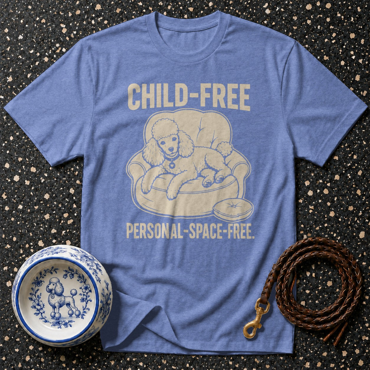 Blue t-shirt with graphic of poodle on couch, text "CHILD-FREE PERSONAL-SPACE-FREE."