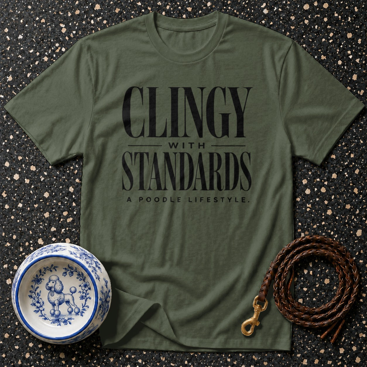 Olive green t-shirt with black text "CLINGY WITH STANDARDS. A POODLE LIFESTYLE."