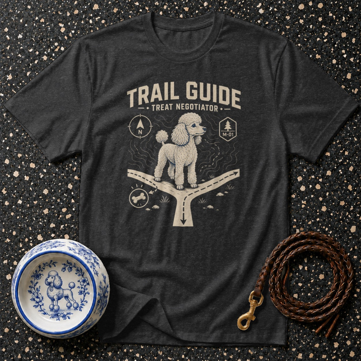 T-shirt with a poodle graphic, "Trail Guide Treat Negotiator" text, and path graphic.