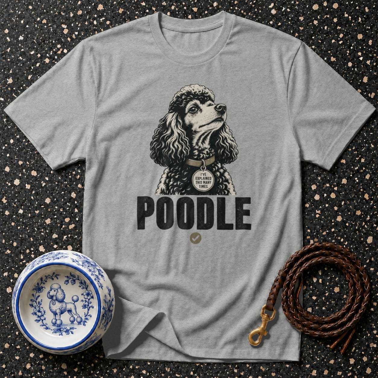 Grey t-shirt with a poodle graphic and the text "POODLE" and "I'VE EXPLAINED THIS MANY TIMES.".