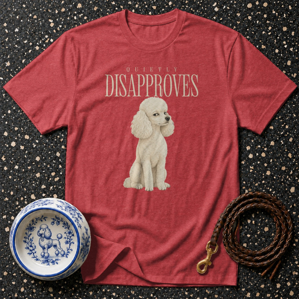 Red t-shirt with a poodle illustration and "Quietly Disapproves" text.