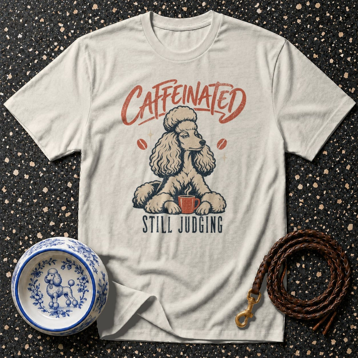 T-shirt with poodle graphic, "Caffeinated Still Judging" text, and coffee beans.