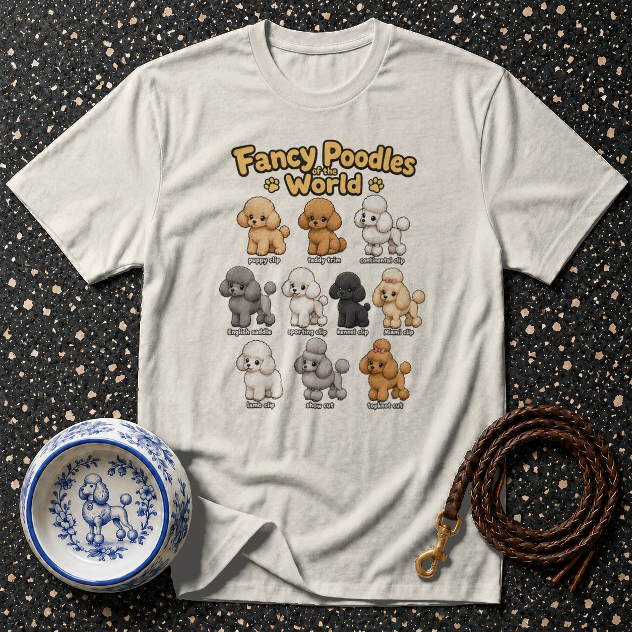 T-shirt features cartoon poodles in various clips with text "Fancy Poodles of the World."