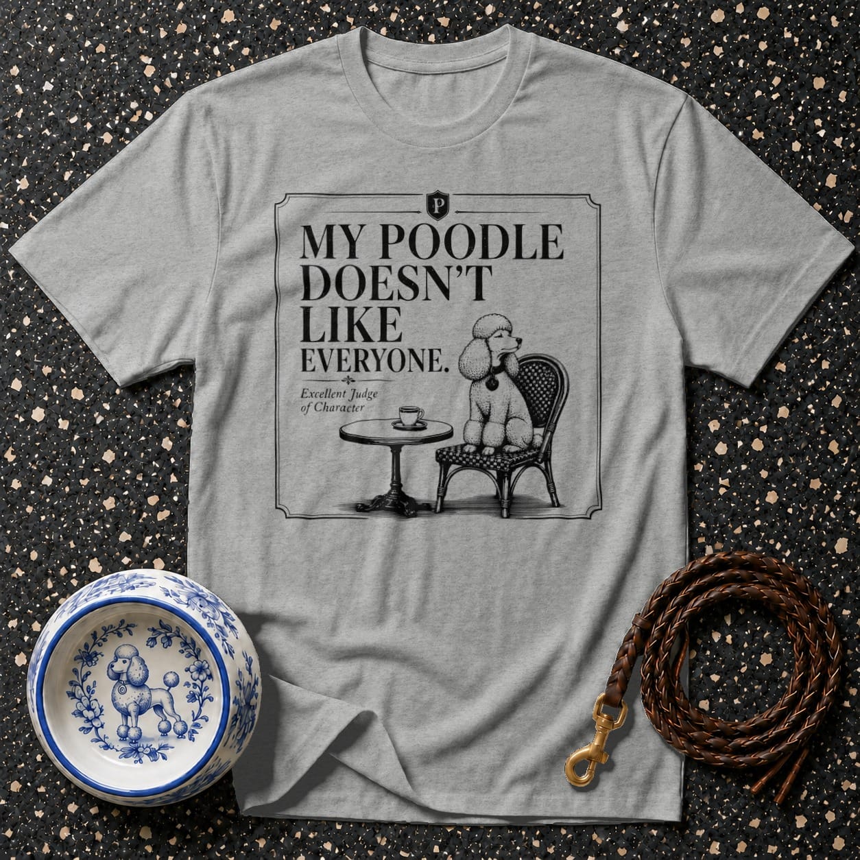 Gray t-shirt with a poodle illustration and text "My poodle doesn't like everyone."