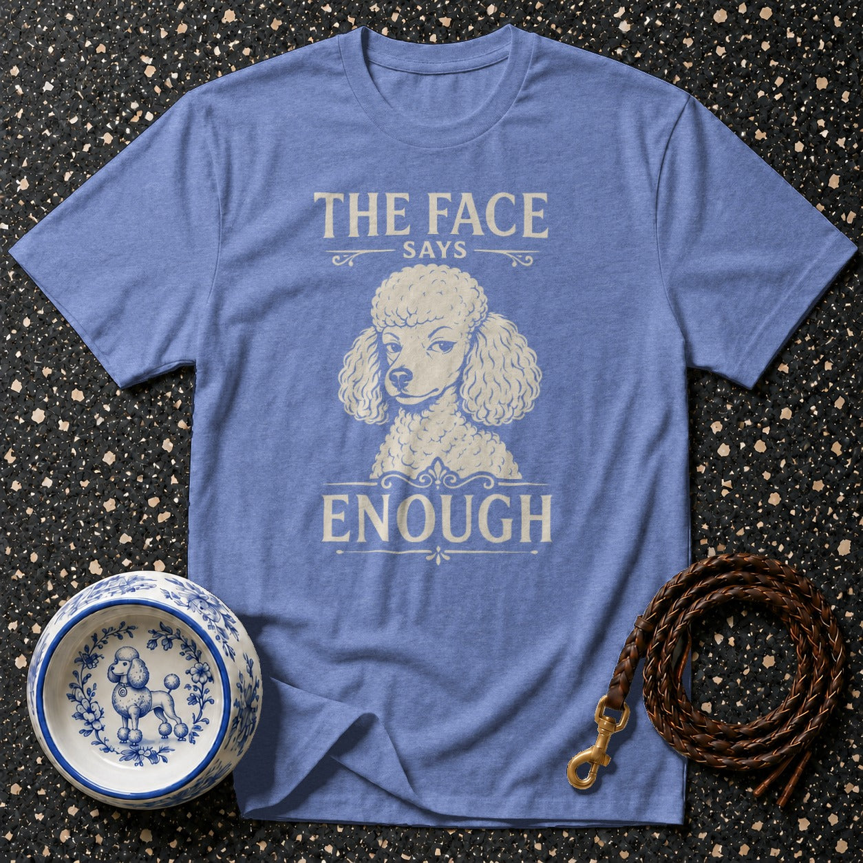Blue t-shirt with a poodle graphic and text "The Face Says Enough".