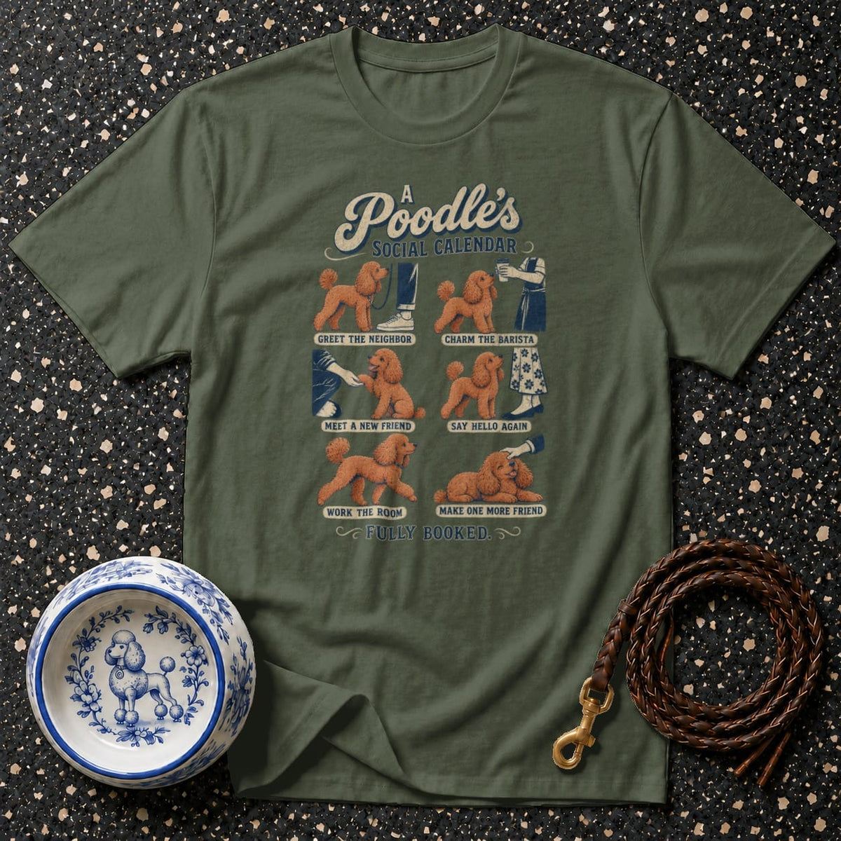Olive green t-shirt with "A Poodle's Social Calendar" graphic.
