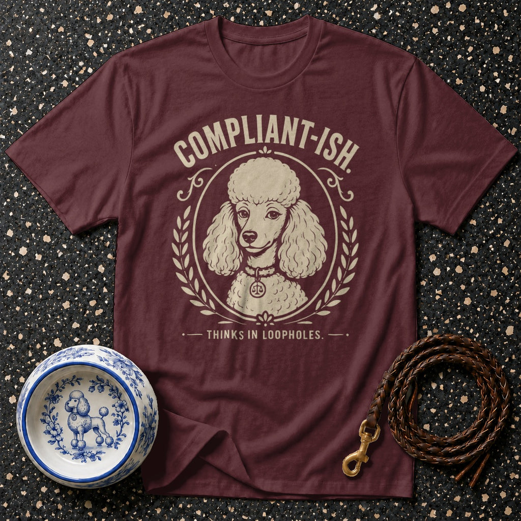 Maroon t-shirt with "COMPLIANT-ISH. THINKS IN LOOPHOLES." and a poodle graphic.