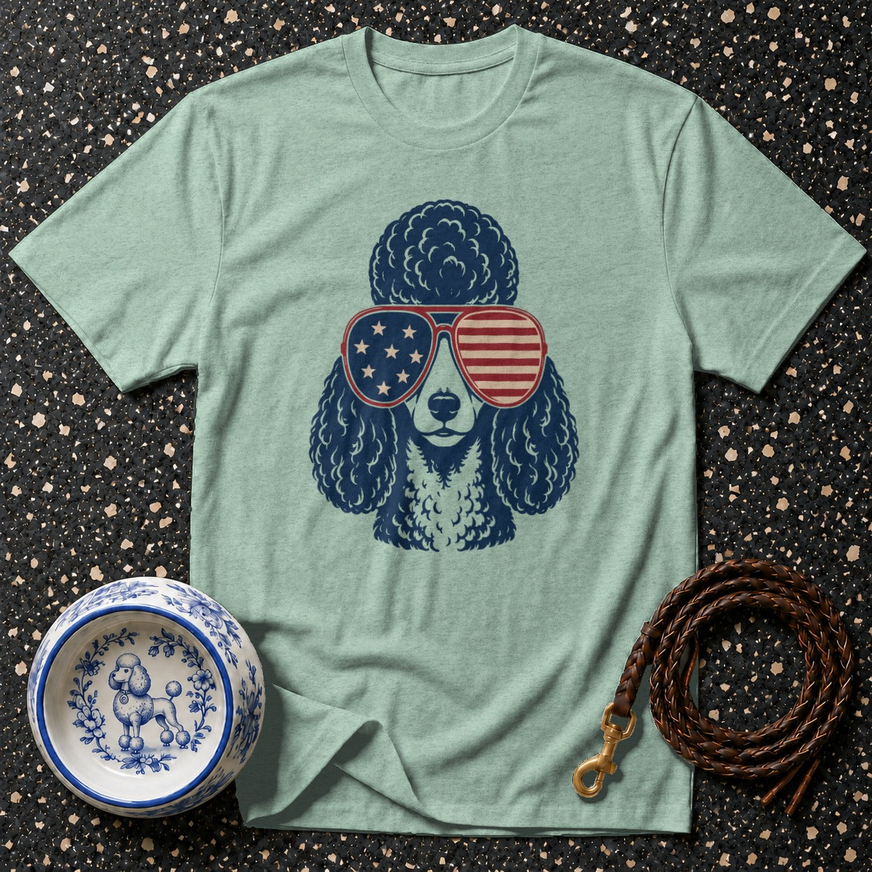 Light blue t-shirt with a poodle wearing American flag sunglasses.