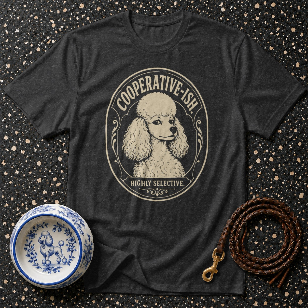 Dark t-shirt with a poodle graphic saying "Cooperative-ish. Highly Selective."
