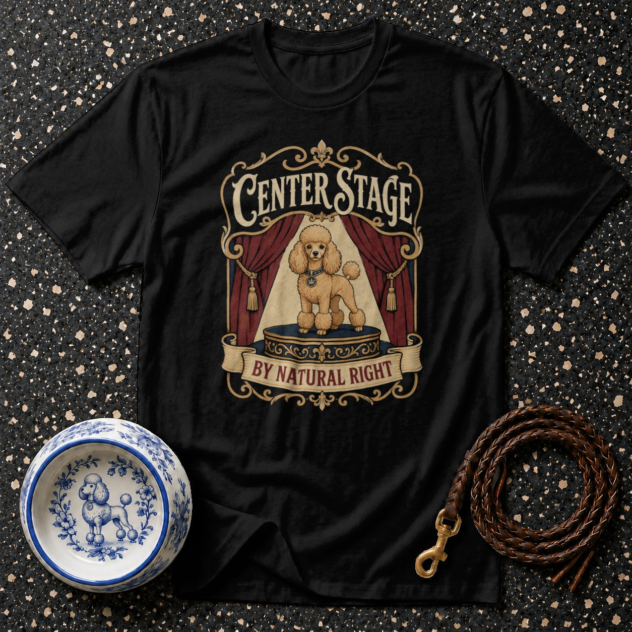 Black t-shirt with "CENTER STAGE BY NATURAL RIGHT" and a poodle design.