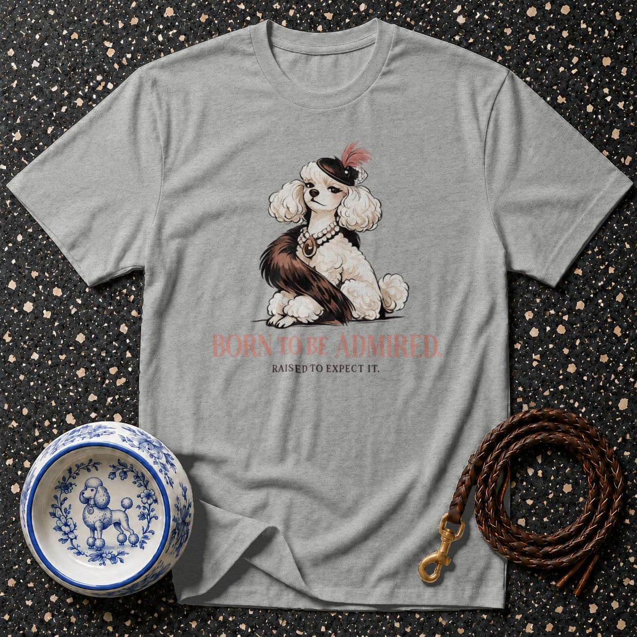 Grey t-shirt with a poodle illustration and "Born to be admired" text.