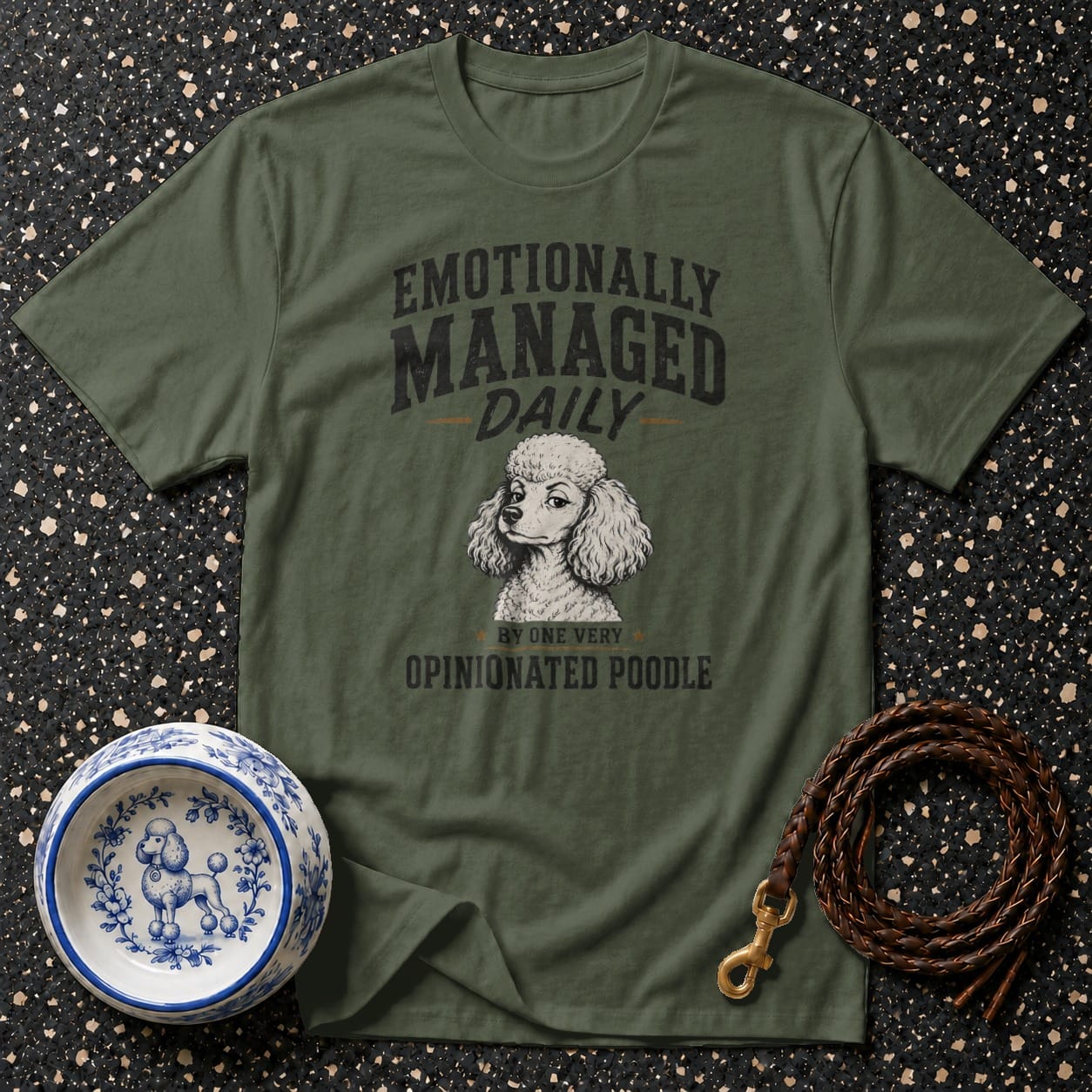 Green t-shirt with text "Emotionally Managed Daily by One Very Opinionated Poodle" and poodle illustration.