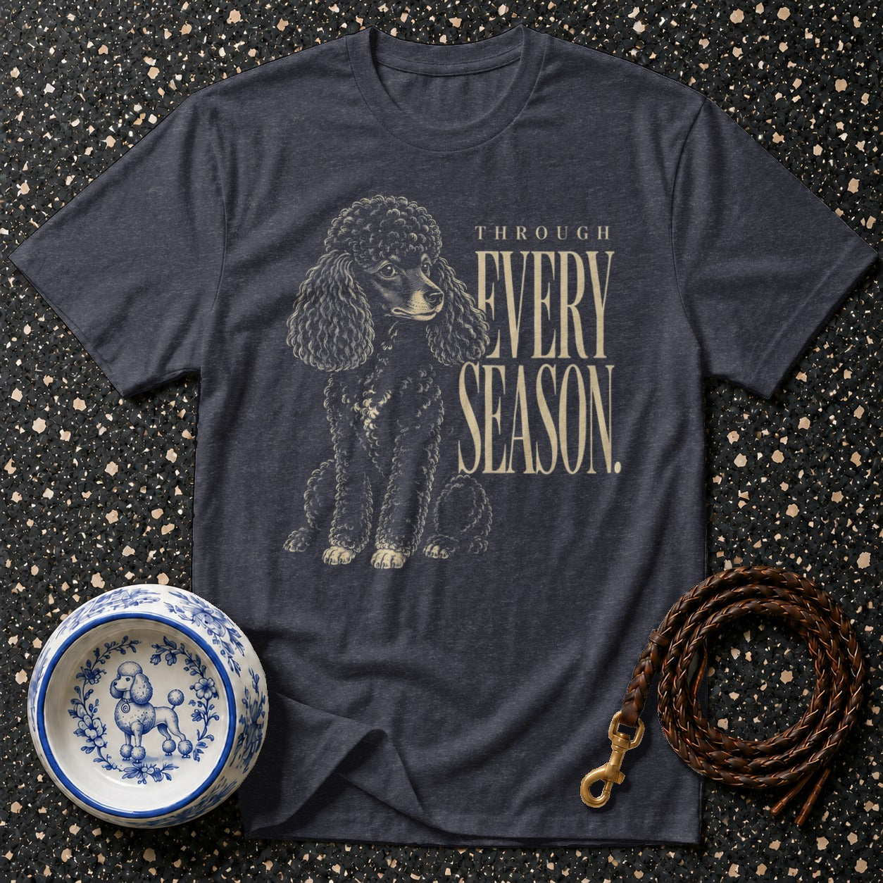 Dark grey t-shirt with a black poodle graphic and text "THROUGH EVERY SEASON."