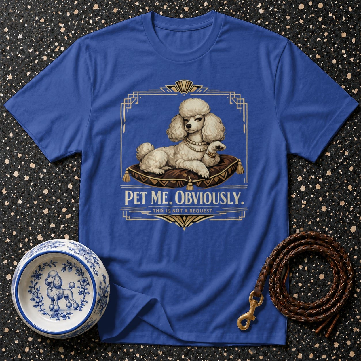 Blue t-shirt with white poodle illustration and text "PET ME. OBVIOUSLY."