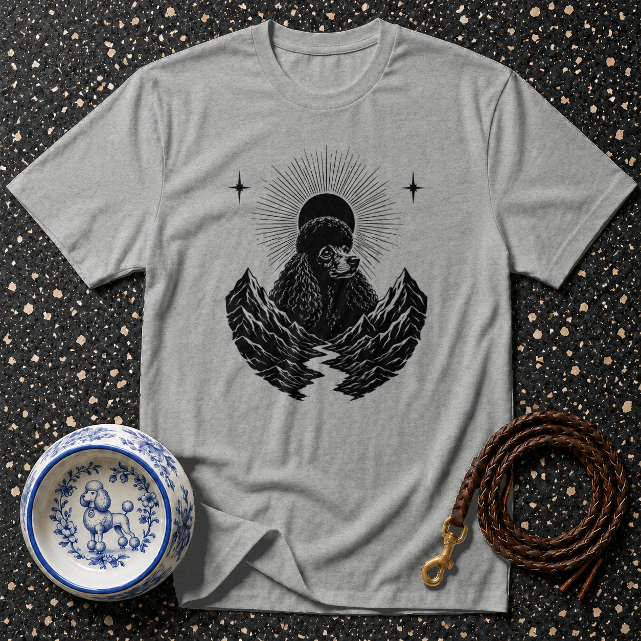 Gray t-shirt with black poodle, mountains, and sun graphic.