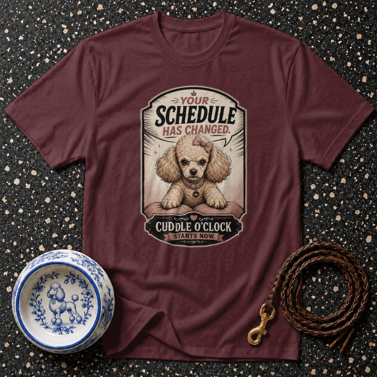 Maroon t-shirt with "Your Schedule Has Changed" and poodle graphic.