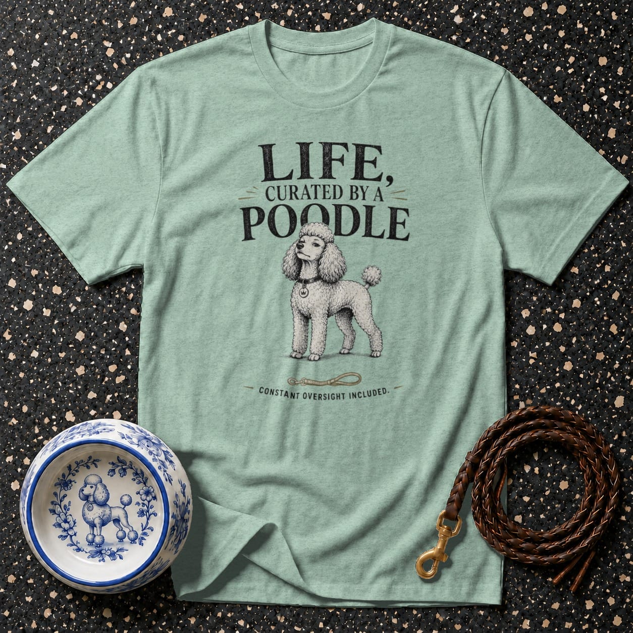 Light green t-shirt with "LIFE, CURATED BY A POODLE" text and poodle illustration.